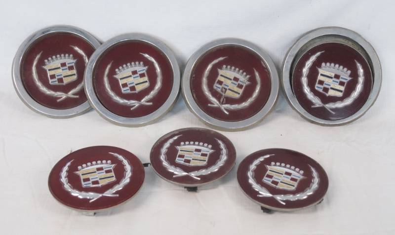 lot 1446 image: CAR PARTS - Really Cool CADILLAC Hubcap Centers or Car Badges