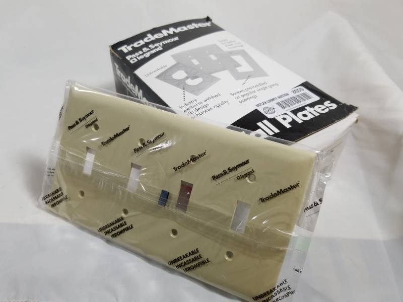 lot 8059 image: Box with 9 Ivory Colored - 4 Toggle Light Switch Wall Plates