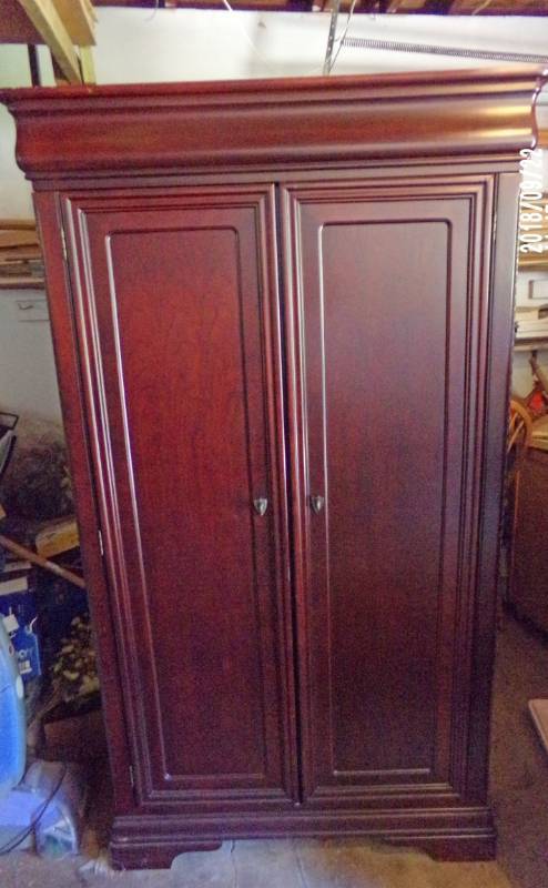 lot 9015 image: red wood colored wardrobe