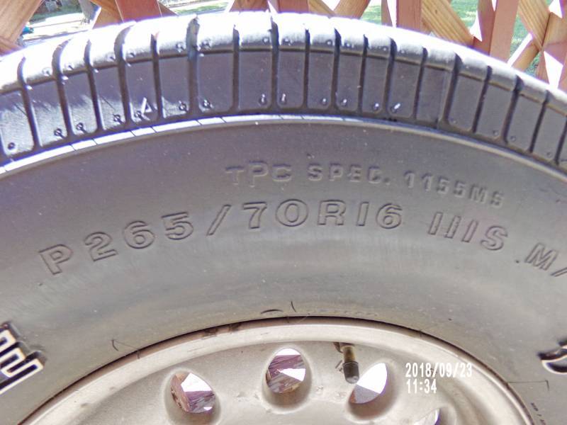 lot 9078 image: tire and rim p26570R16
