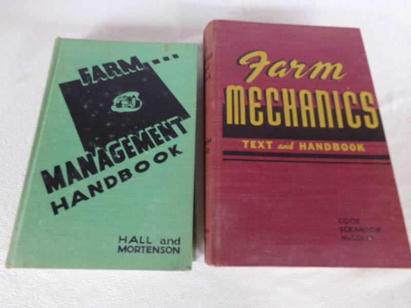 lot 9209 image: two farm manuals