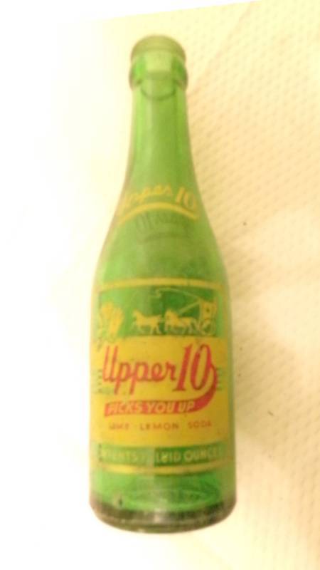 lot 9550 image: Upper 10 Glass Bottle From Beloit, KS