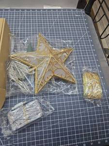 lot 28541 image: Elegant Gold-Trimmed Star Tree Topper Festival Set