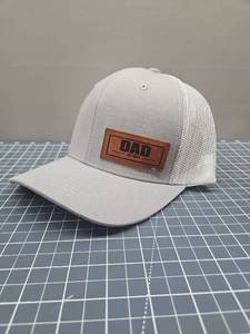 lot 28694 image: Dad Est. 2025 Leather Patch Trucker Hat
