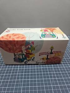 lot 28725 image: Interactive Smoke Fruits Truck Toy