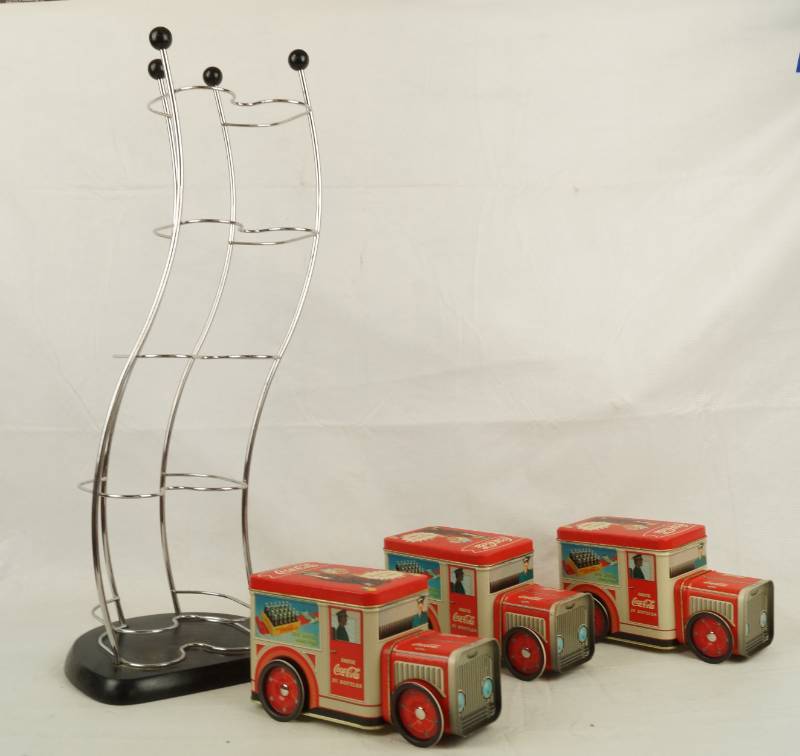 lot 6059 image: Black and Silver Metal CDGame disc rack and Three Coca Cola Collectible Truck Tins - NICE