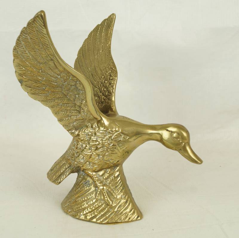lot 6035 image: Brass Duck in Flight - 9 tall - heavy