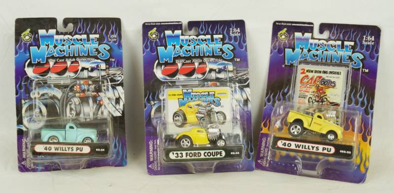 lot 6041 image: Lot of 3 Muscle Machines - Die Cast Collectible Cars 164 scale New in Packages