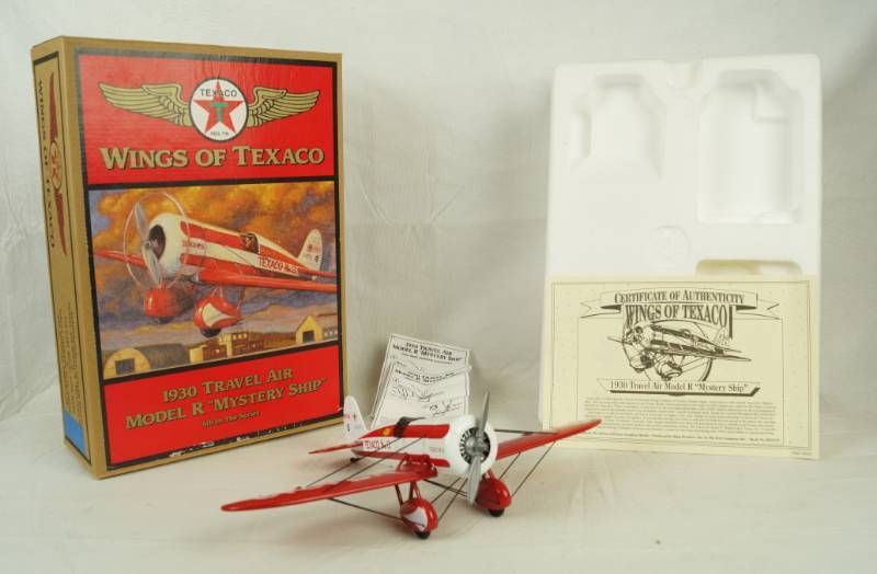 lot 6046 image: ERTL Collectibles Die Cast Airplane Bank - Wings of Texaco - 1930 Travel Air Model R Mystery Ship w box and COA