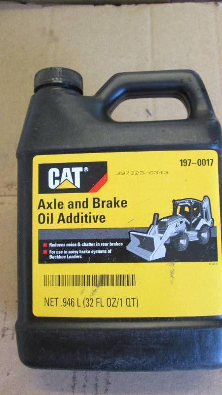 lot 456 image: Lot of 11 Quarts 197-0017 Cat Axle & Brake Oil Additive