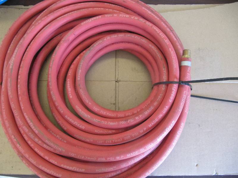 lot 487 image: New Good Year 12 Inch Shop Air Hose Approx 25  (Shop Tools)