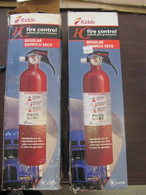 lot 499 image: New Two OSHA Approved Fire Extinguishers - New But Worn Boxes