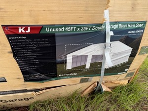 lot 958 image: Unused 25 x 45 x 14 Double Garage Steel Barn in Cream Color
