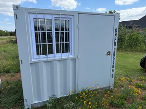 lot 987 image: Unused 7 foot Container with side entry door and window.  Brand New Container