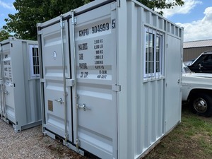 lot 983 image: Unused 9 foot Container with side entry door and window.  Brand New Container