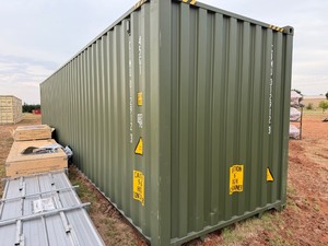lot 972 image: 40 Foot First Time Use High Cube Conex Container with Rear Doors.  Flat Green in Color, Very nice shape.
