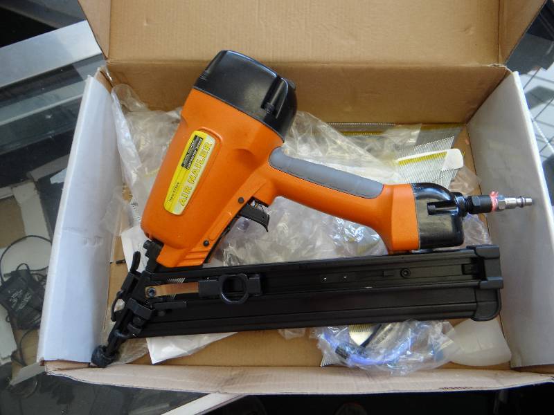 lot 4735 image: Central Pneumatic nail gun