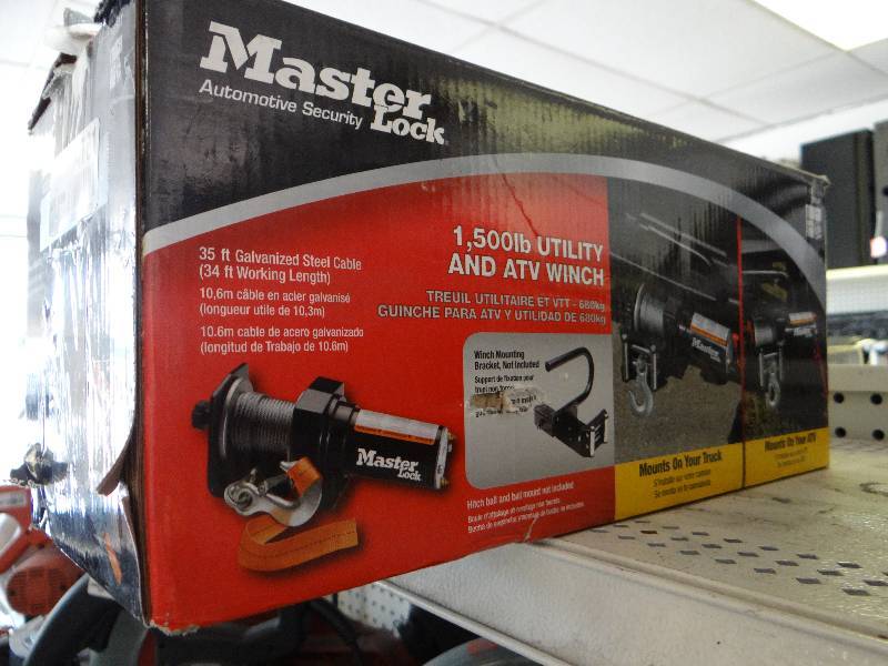 lot 4781 image: Masterlock 1,500lb utility & atv winch