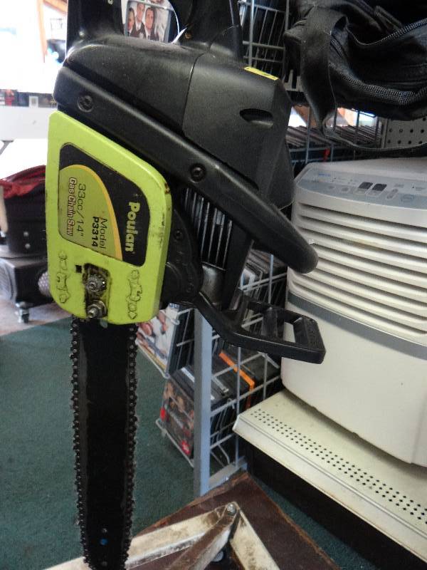 lot 4831 image: Ryobi 14 inch gas chain saw
