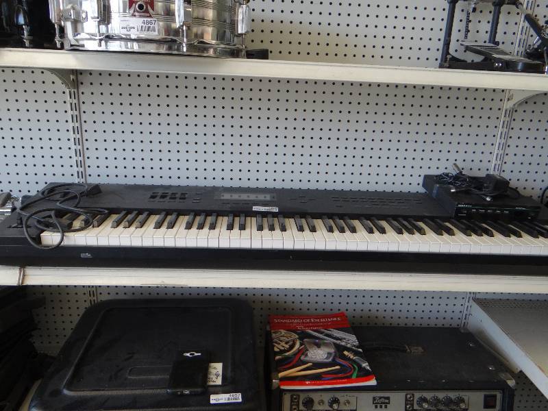 lot 4855 image: Roland A-80 MIDI Key board contoller w case & Kurzweil Micro piano