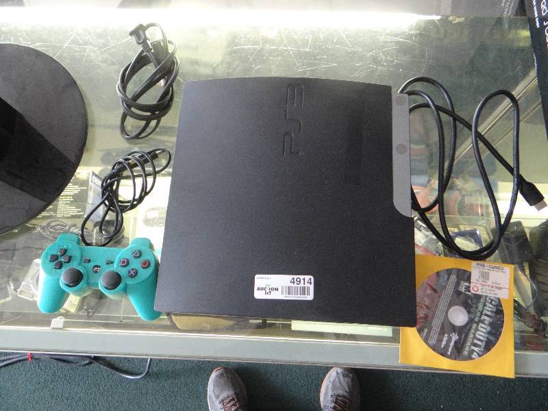 lot 4914 image: Playstation 3 w power cords & game