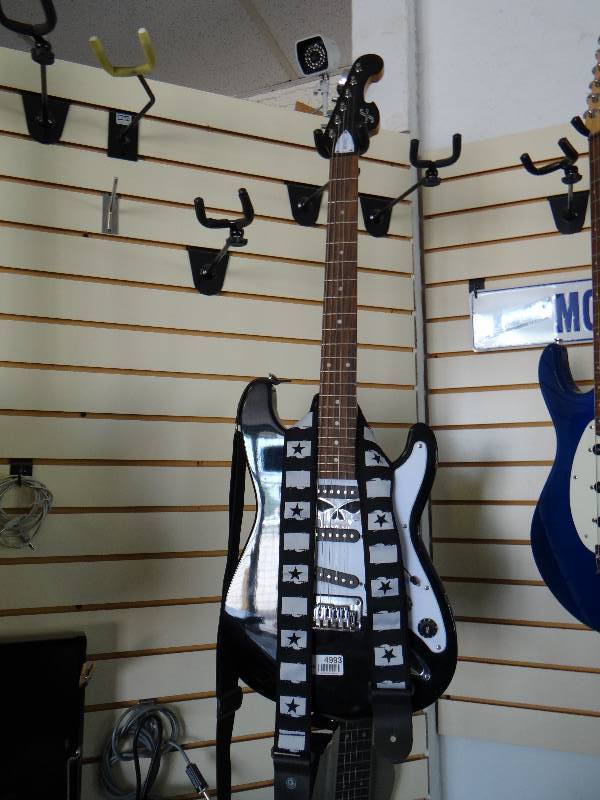 lot 4993 image: First act electric guitar w shoulder strap