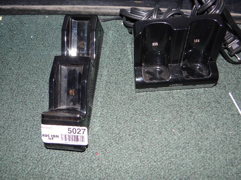 lot 5027 image: Xbox and Wii controller chargers.