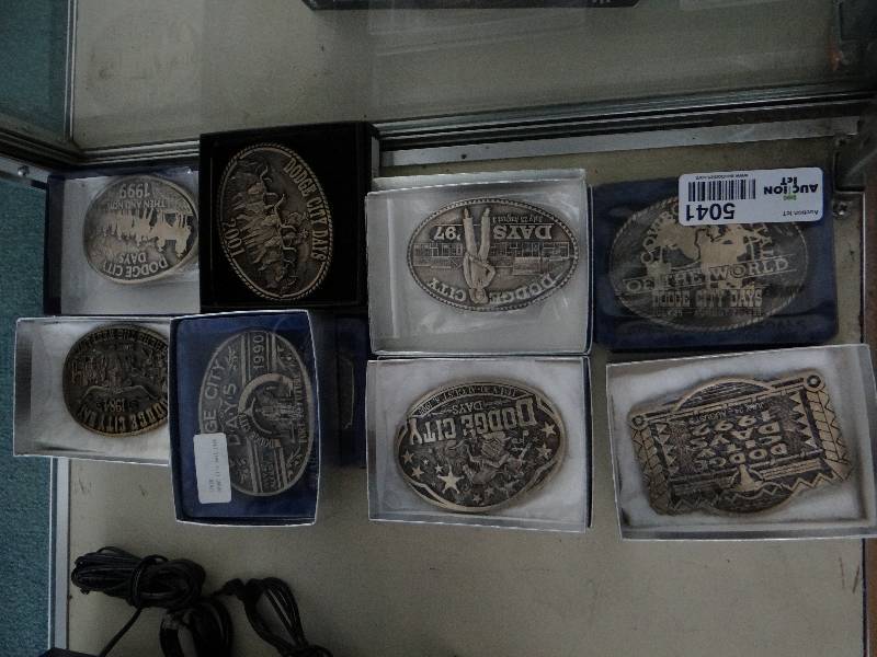 lot 5041 image: Large lot of Dodge City belt buckles