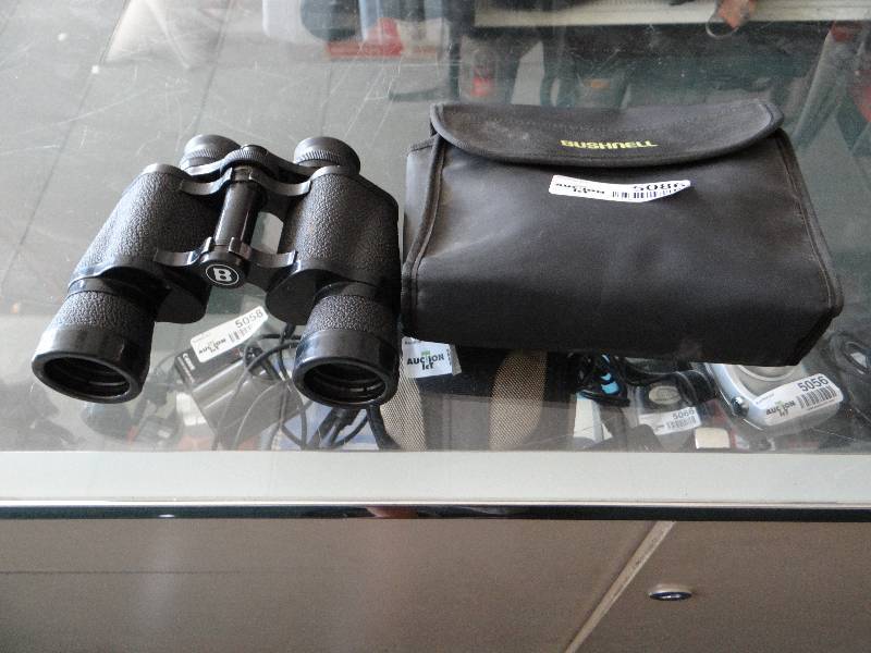 lot 5086 image: Bushnell Birder 357ft at 1000 yards binoculars w case