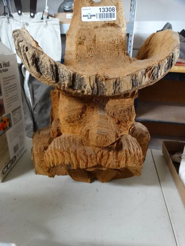 lot 13308 image: Wooden carved cowboy.