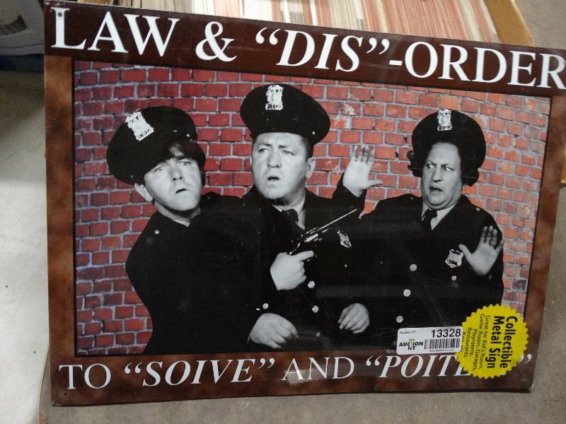 lot 13328 image: The 3 stooges metal sign.