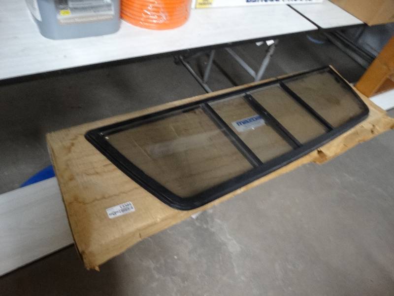 lot 13386 image: Mazda truck side window.
