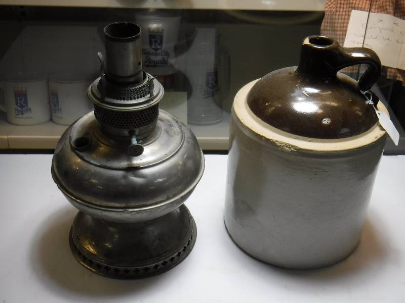 lot 7047 image: whiskey stone jug kerosene lamp