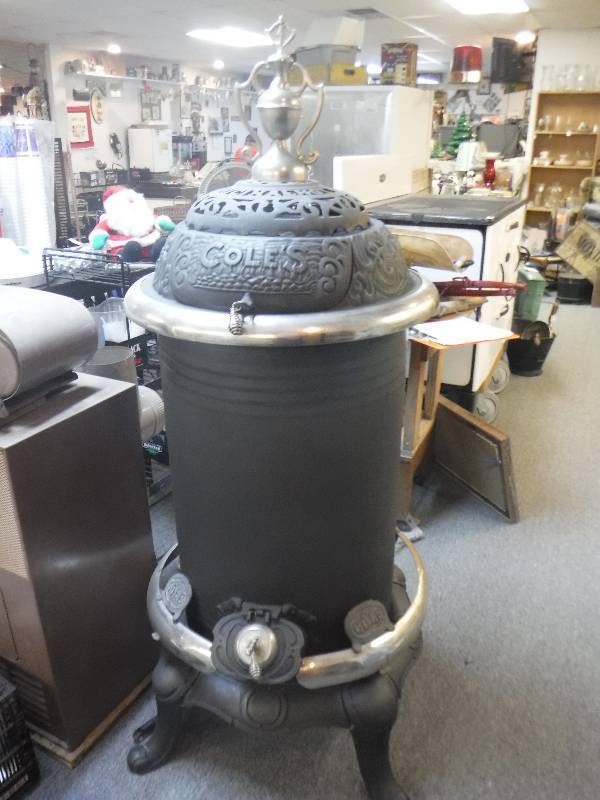 lot 4879 image: ANTIQUE COLES PARLOR STOVE - Great Condition