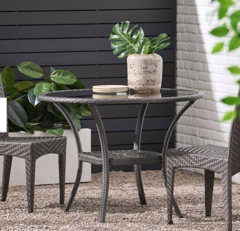lot 19917 image: Round Woven Patio Dining Table with Glass Top - Retail $175