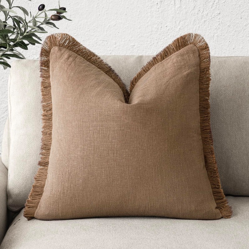 lot 1018019 image: Foindtower Decorative Linen Fringe Throw Pillow Covers Cozy Boho Farmhouse Cushion Cover with Tassels Soft Accent Pillowcase for Chair Sofa Bed Living Room Home Decor, 22�22 Inch, 1PC, Khaki Brown - Retail $18