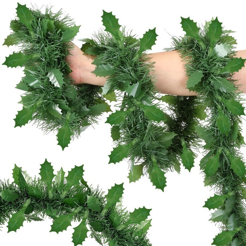 lot 1022511 image: 33Ft Christmas Artificial Green Garland with Green Leaves and Hanging Vines - IndoorOutdoor Christmas Greenery for Home, Xmas Tree, Fireplace - Holiday Party Decor - Retail $13