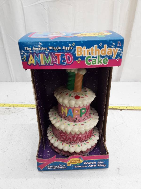 lot 32686 image: The Amazing Wiggle Jiggle Animated Birthday Cake