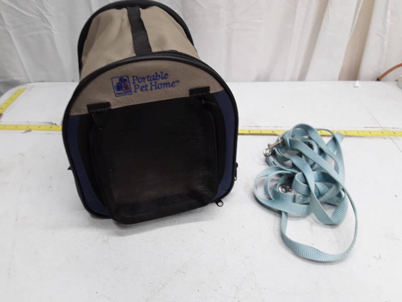 lot 32719 image: Portable Pet Home Soft-Sided Pet Carrier with leash