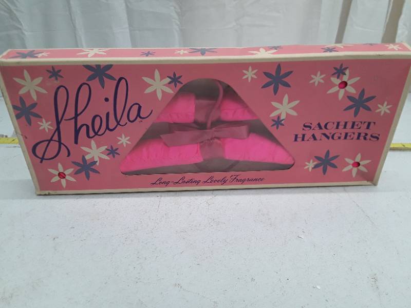 lot 32729 image: Sheila Sachet Hangers by Gold Seal Company 1968