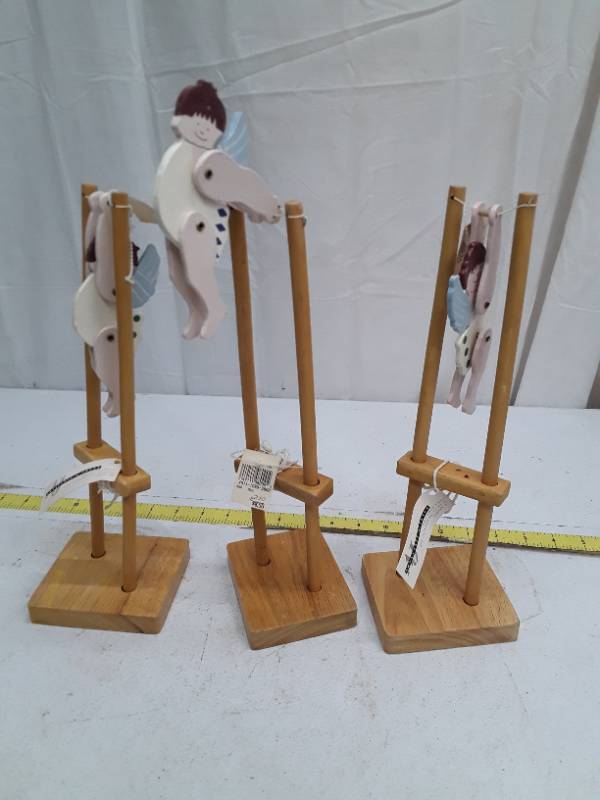 lot 32838 image: Arnautoff & Jones Wooden Angel Acrobat Display 1991 - 3 pack