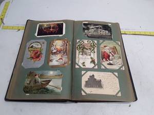 lot 33463 image: Vintage Postcard Collection with Floral Cover