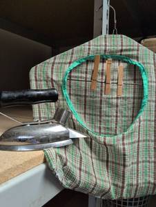 lot 638 image: Vintage Flat Iron with Wooden Clothes Pins