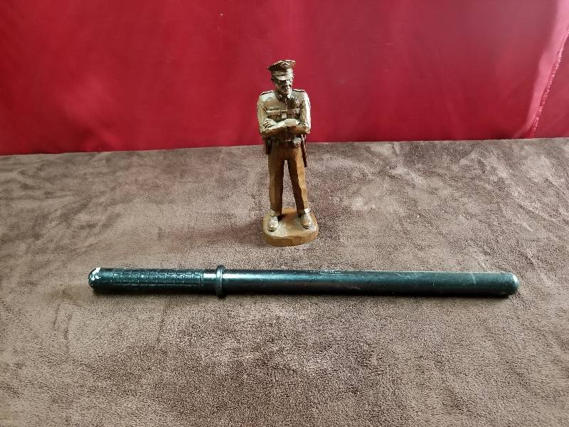 lot 7802 image: Hand Carved Policeman Statue and Batton
