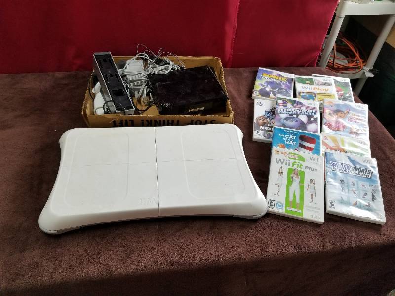 lot 7871 image: Complete Wii System and Games and Accessories