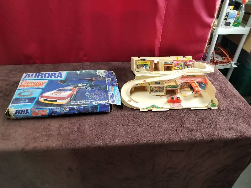 lot 7875 image: Tomy Aurora Camaro Challenge and Vintage Toy Garage