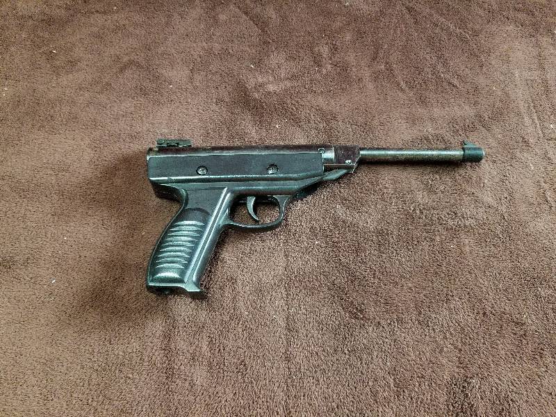 lot 7876 image: Vintage Working Pump Pistol