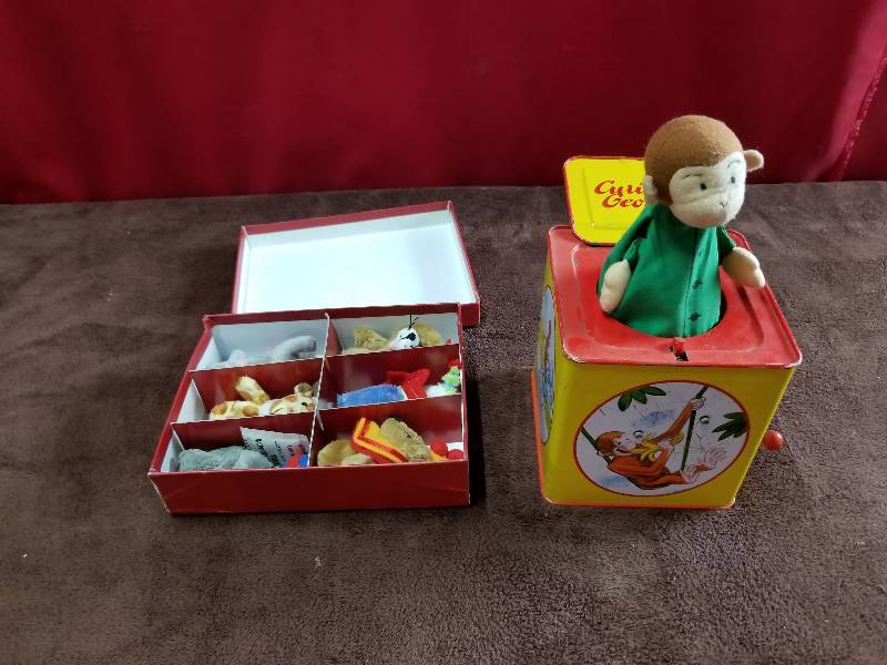 lot 7892 image: Curious George and Finger Puppets