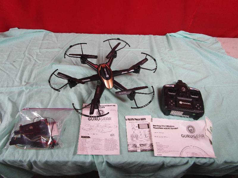 lot 7133 image: Guru Gear Drone