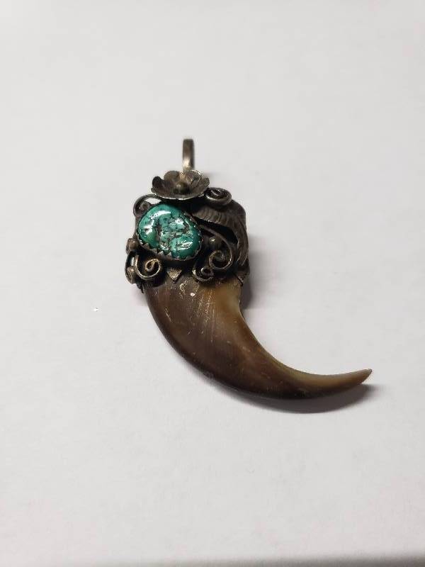 lot 7074 image: Sterling Silver Antique Tooth Teal Stone Necklace Pendant